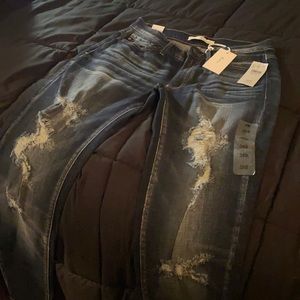 Kan kan mid rise skinny jeans